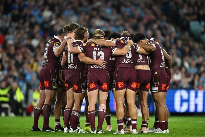 Queensland team huddle.