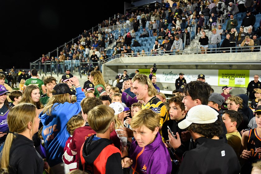 Ryan Papenhuyzen is surrounded by fans at Sunshine Coast Stadium after his first game back in more than a year. 