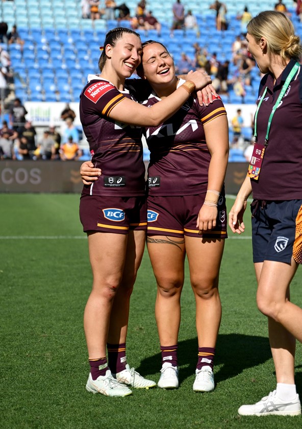 Lauren Dam and Rhemy Hinckesman celebrate after defeating the Titans.