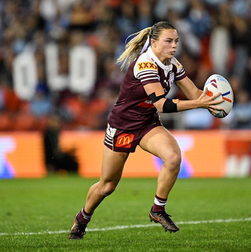 Rory Owen runs with the ball for Queensland in the opening match.