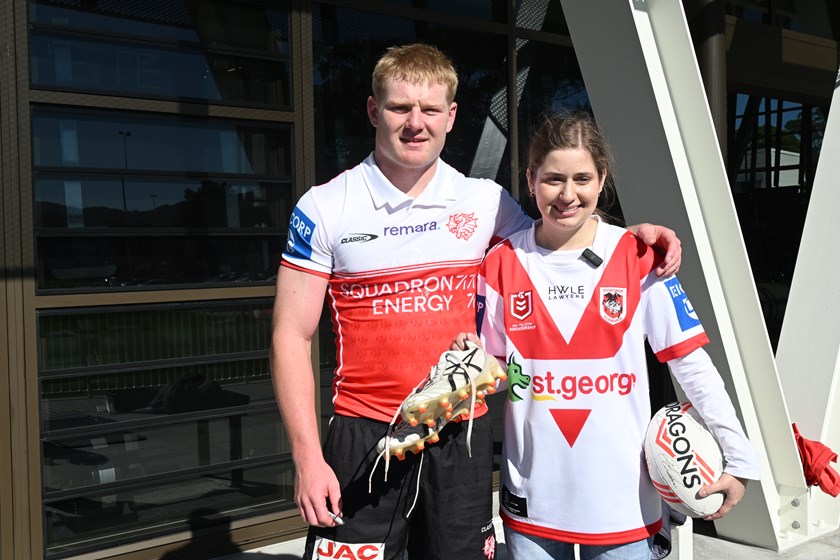 Dylan Egan signed a pair of boots for Charlotte as part of the Make-A-Wish experience.