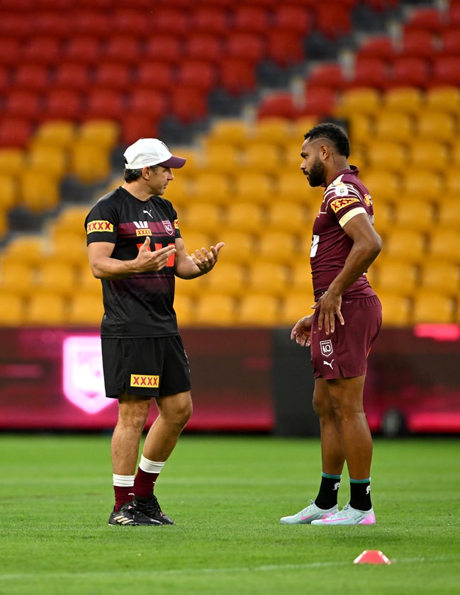 Queensland Maroons coach Billy Slater discusses plans with Hamiso Tabuai-Fidow.