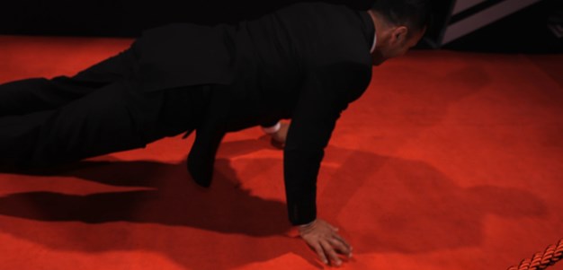 Wiki punches out push-ups on Hall of Fame red carpet
