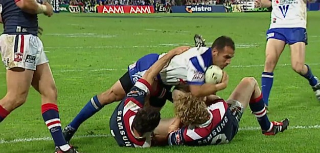 El Masri outmuscles the Roosters defence
