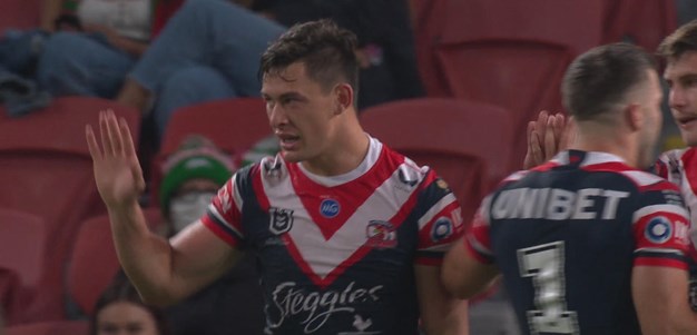 Manu leaps high to get a Roosters try
