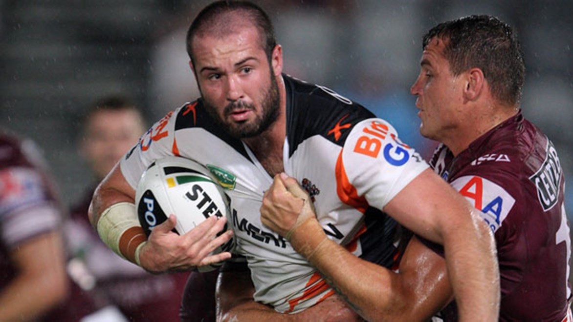 Prop Aaron Woods is bracing for a classic confrontation up front with Nigel Plum when the Tigers lock horns with the resurgent Panthers at Centrebet Stadium on Sunday.