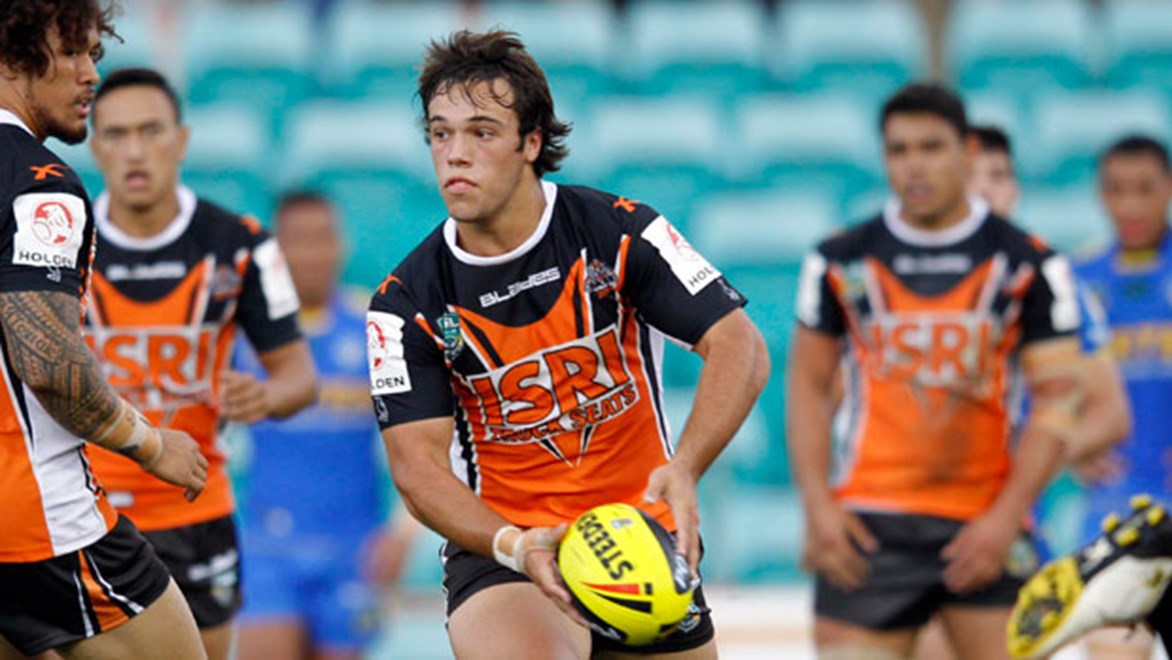Wests Tigers have moved quickly to shore up their halves stocks with the re-signing of under-20s stars Luke Brooks and Mitchell Moses.