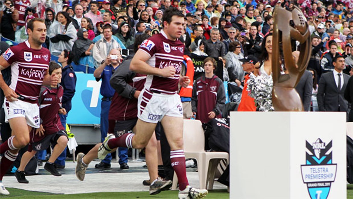 Jamie Lyon leads Manly out onto the field for their last grand final victory in 2011.