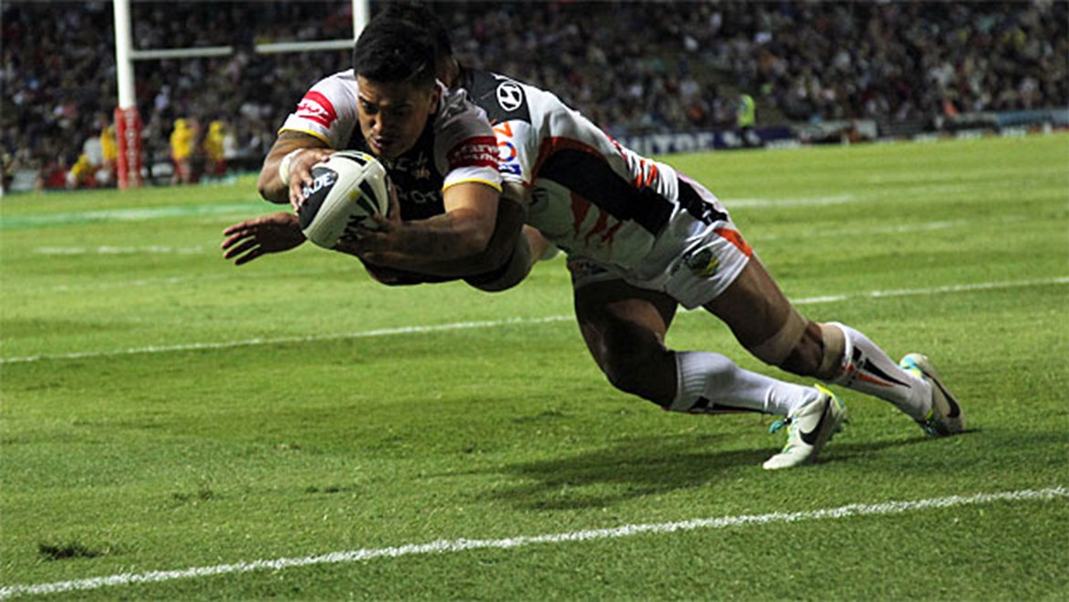 Wayne Ulugia crosses for one of his two first-half tries