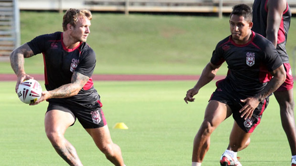 The Emerging Maroons squad work on combinations at their training camp.