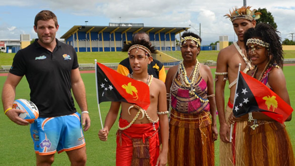Northern Pride star Blake Leary with representatives from the Cairns PNG Wantoks Association.