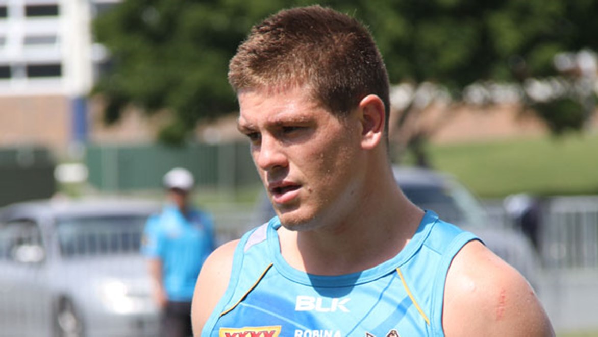 Titans rookie Paul Carter is being groomed for an NRL bench spot having been named at hooker for Sunday's trial against the Warriors.