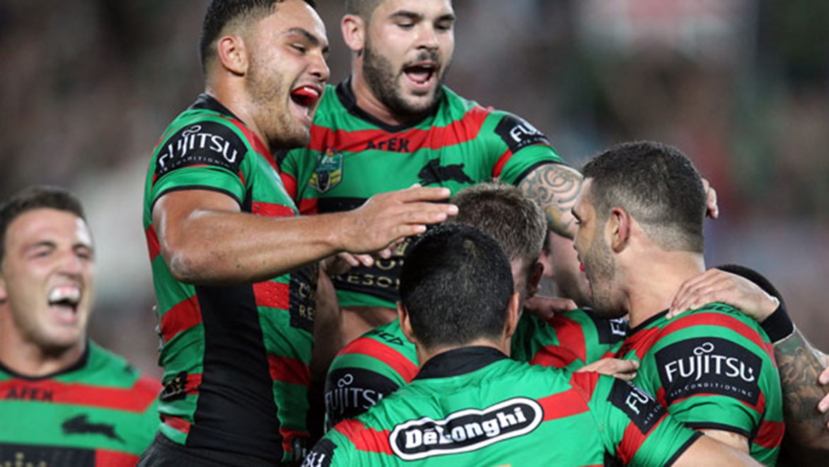 The Rabbitohs celebrate Greg Inglis' second try early in the second half. Copyright: Grant Trouville / NRL Photos.