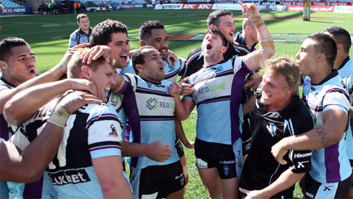 The Sharks celebrate their 2013 VB NSW Cup Grand Final triumph. From 2014 the NSW Cup winners will play Queensland's Intrust Super Cup premiers on Grand Final day. Copyright Grant Trouville/NRL Photos.