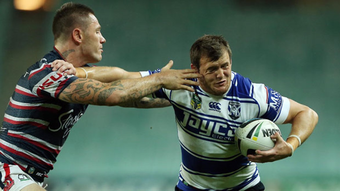 Josh Morris shrugs off a defender in the Bulldogs' Round 5 clash with the Roosters. Copyright: Robb Cox/NRL Photos.
