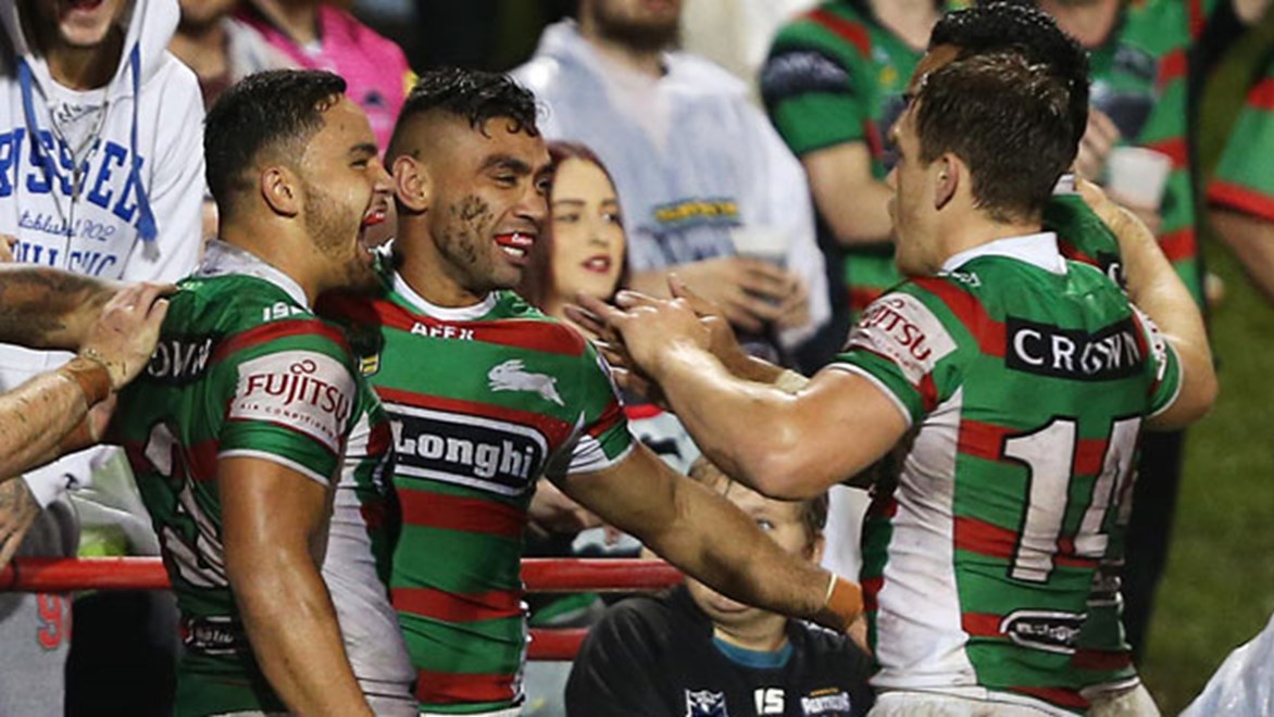 Rabbitohs winger Nathan Merritt (second left) becomes South Sydney's greatest try-scorer by notching his 145th four-pointer for the club against Penrith on Friday night. Copyright: Robb Cox/NRL Photos