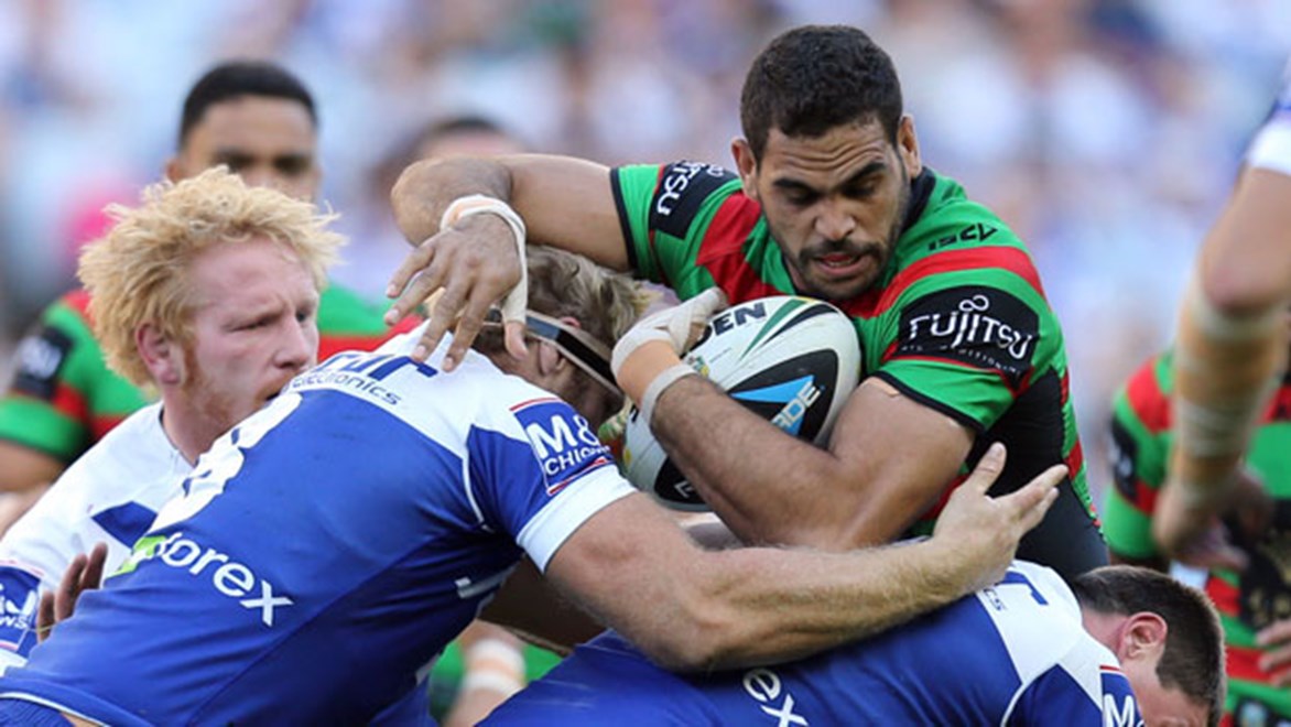 South Sydney fullback Greg Inglis is well contained by the Bulldogs defence during the first half of their Good Friday clash at ANZ Stadium.