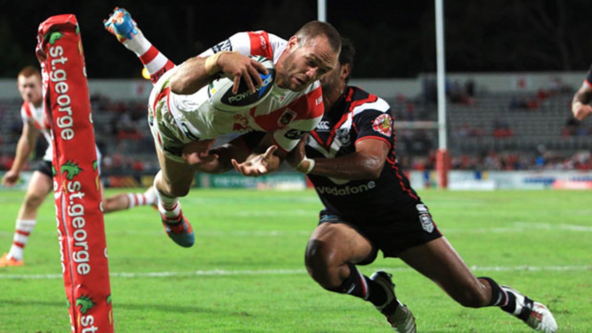 Dragons winger Jason Nightingale scores an amazing try for his side during their clash against the Warriors on Saturday night.