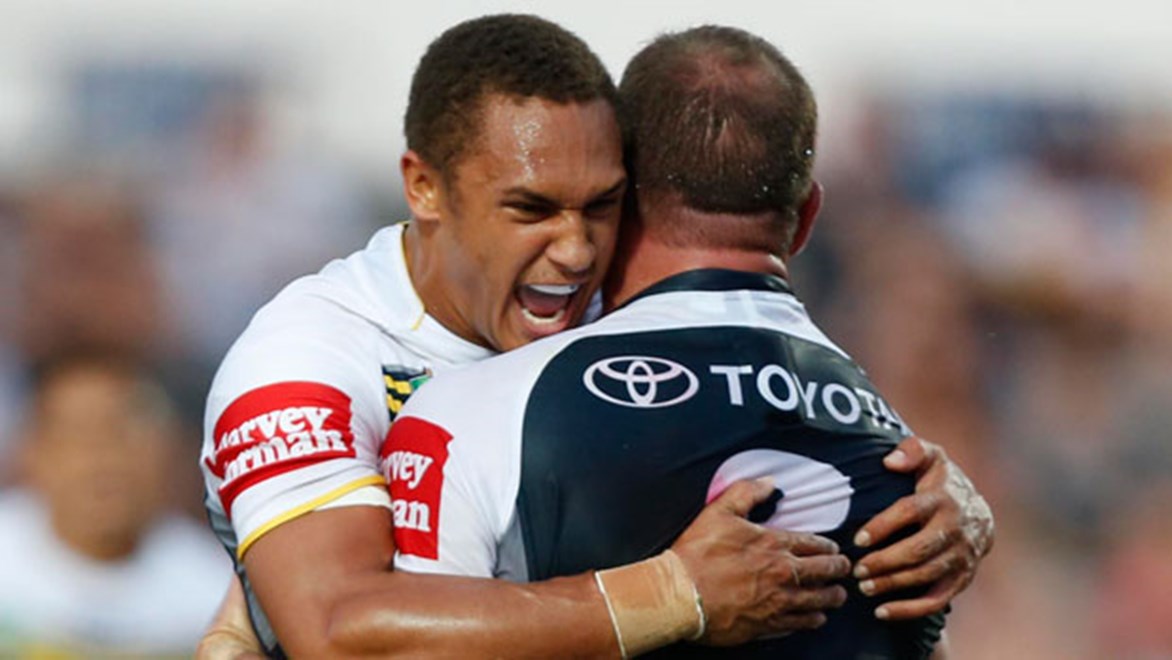 Man of the match Ray Thompson congratulates Matt Scott on his first-half try against the Eels.