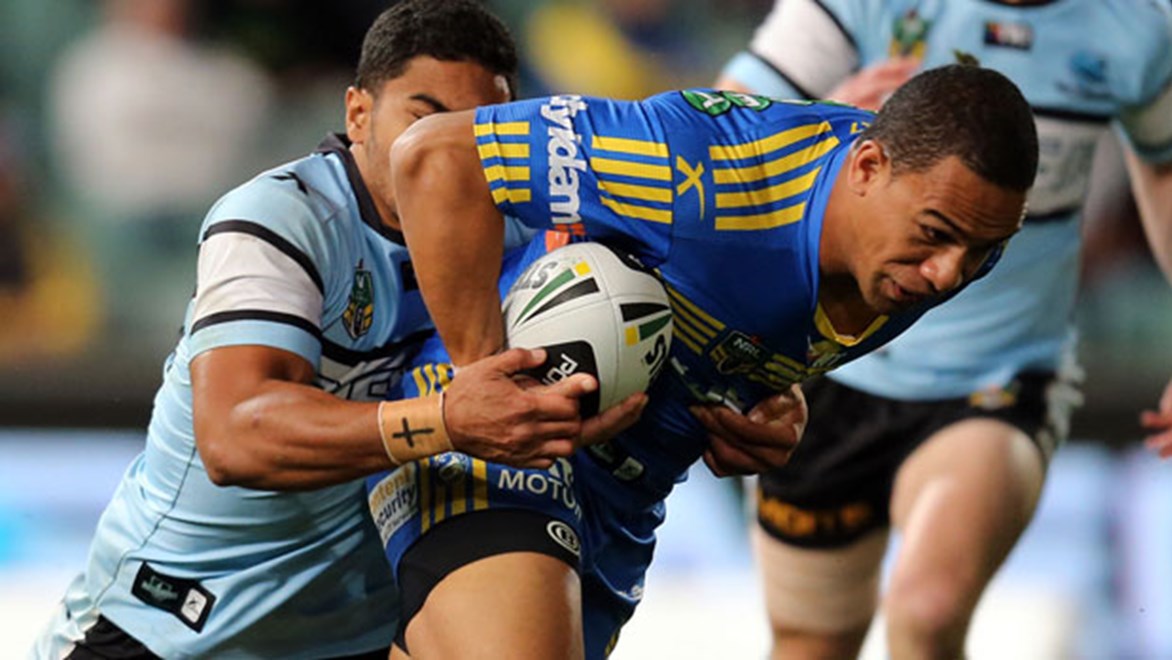 Eels centre Will Hopoate takes on the Sharks defence during their Monday night clash at Pirtek Stadium