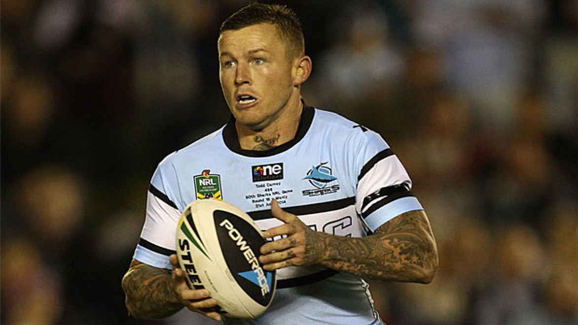Cronulla five-eighth Todd Carney has had his contract terminated by the club after a lewd photo was circulated on social media.