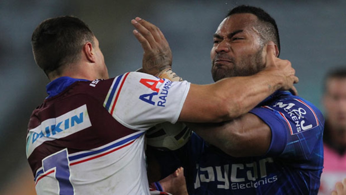 Canterbury's makeshift halfback Tony Williams gives his Manly opposite Jack Littlejohn the big 'don't argue'.