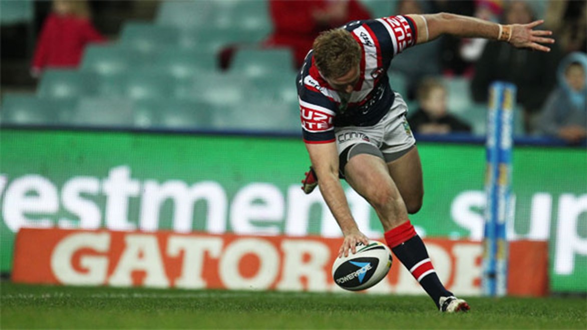 Mitchell Aubusson touches down for a try during the Roosters' first-half rampage against the Sharks at Allianz Stadium.
