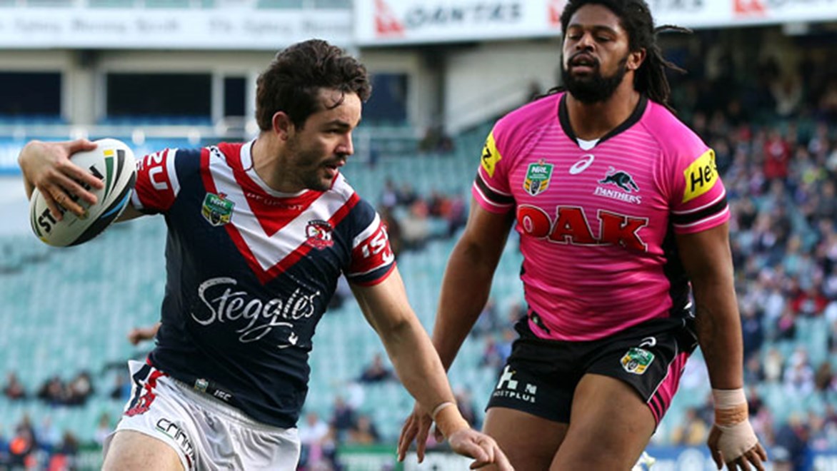 Aidan Guerra crosses for a try during the Roosters' first-half blitz against the Panthers.
