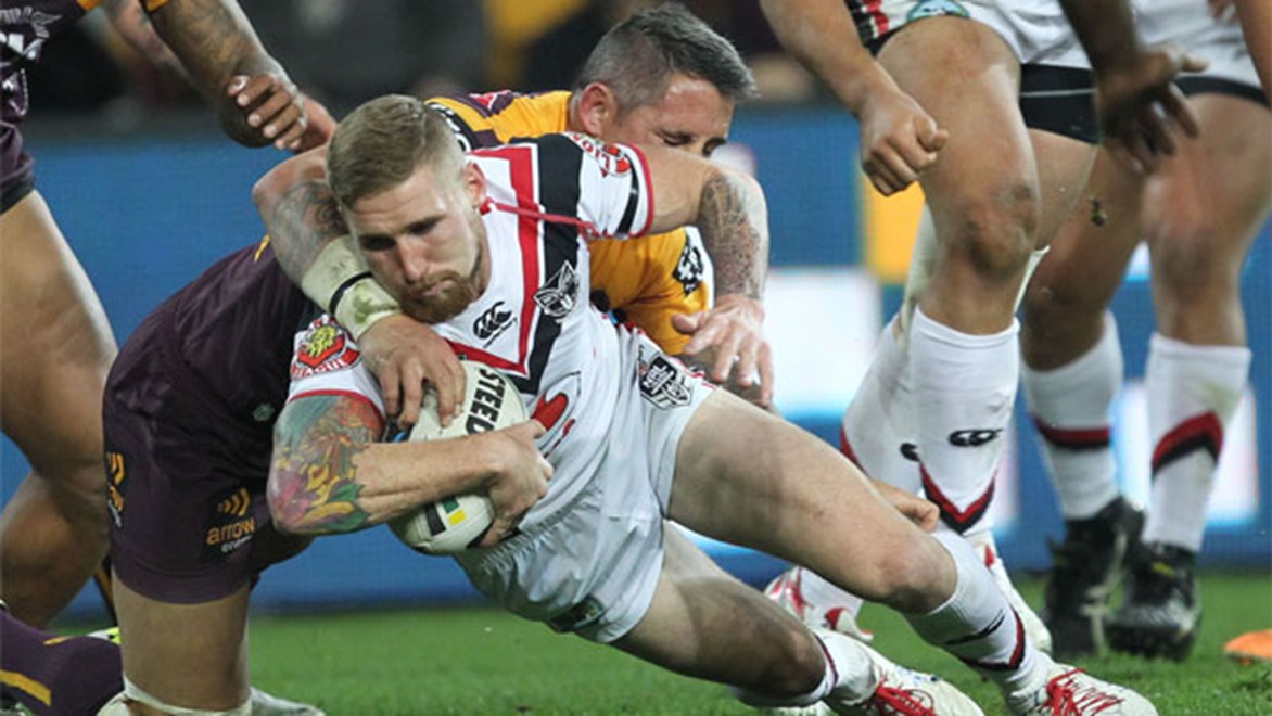 Sam Tomkins scores for the Warriors against Brisbane on Saturday night.