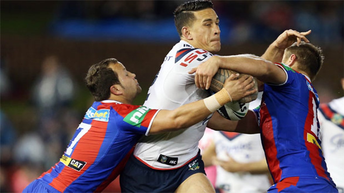 Sonny Bill Williams is met by the Newcastle defence on Friday night.