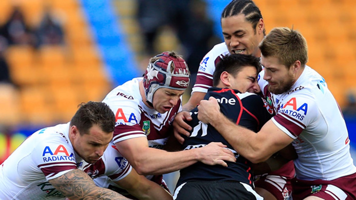 Ben Henry met by the Sea Eagles defence during their Round 20 clash at Mt Smart Stadium.