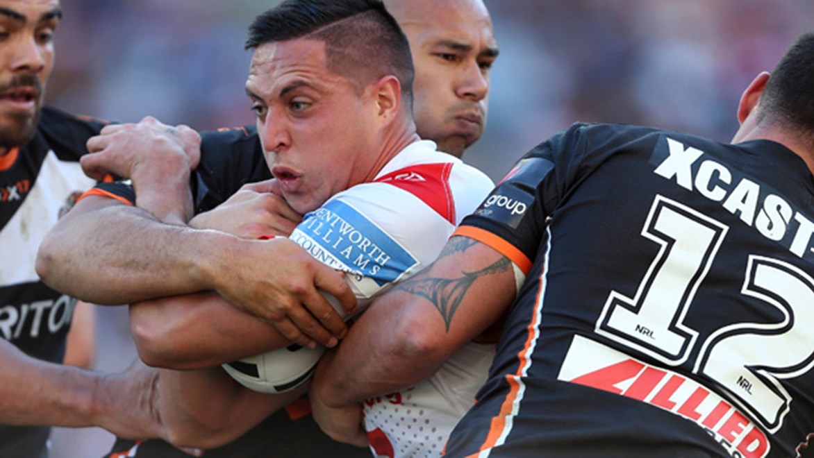 Gerard Beale is tackled during the Dragons' Round 20 clash with the Wests Tigers at ANZ Stadium.