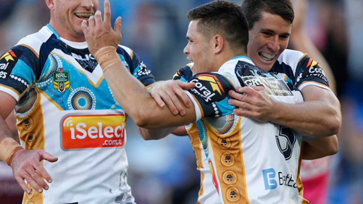 James Roberts celebrates a try with teammates during the Titans' Round 23 loss to the Sea Eagles.
