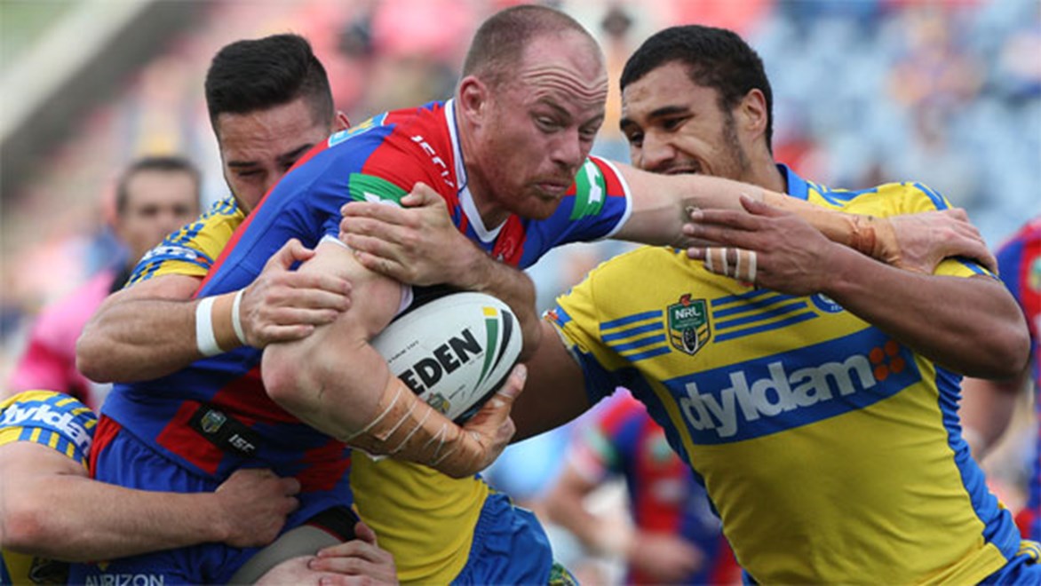 Newcastle's Beau Scott hits it up against the Eels during their Round 25 clash at Hunter Stadium.
