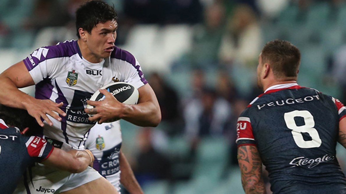 Jordan McLean charges forward for the Storm during their Round 25 clash with the Roosters at Allianz Stadium.