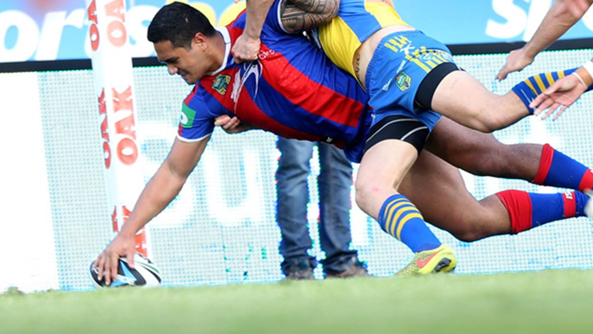 Chanel Mata'utia scores one of his three tries in the Knights' Round 25 win over the Eels at Hunter Stadium.