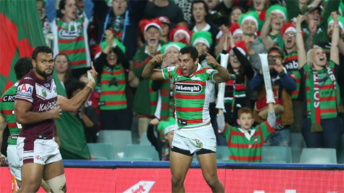Alex Johnston celebrates in front of jubilant South Sydney fans during their win over Manly on Friday night.