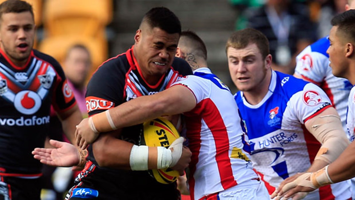 Warriors' NYC player of the year Sam Lisone crashes into the Newcastle defence.