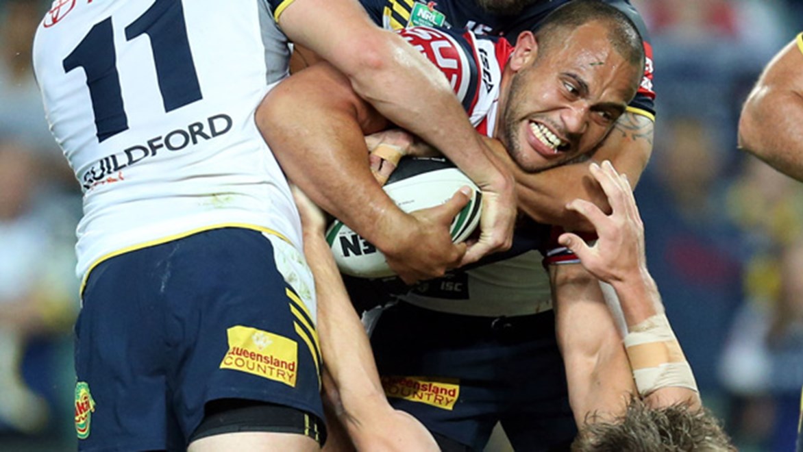 Sam Moa charges forward in the Roosters' semi-final showdown with the Cowboys at Allianz Stadium.