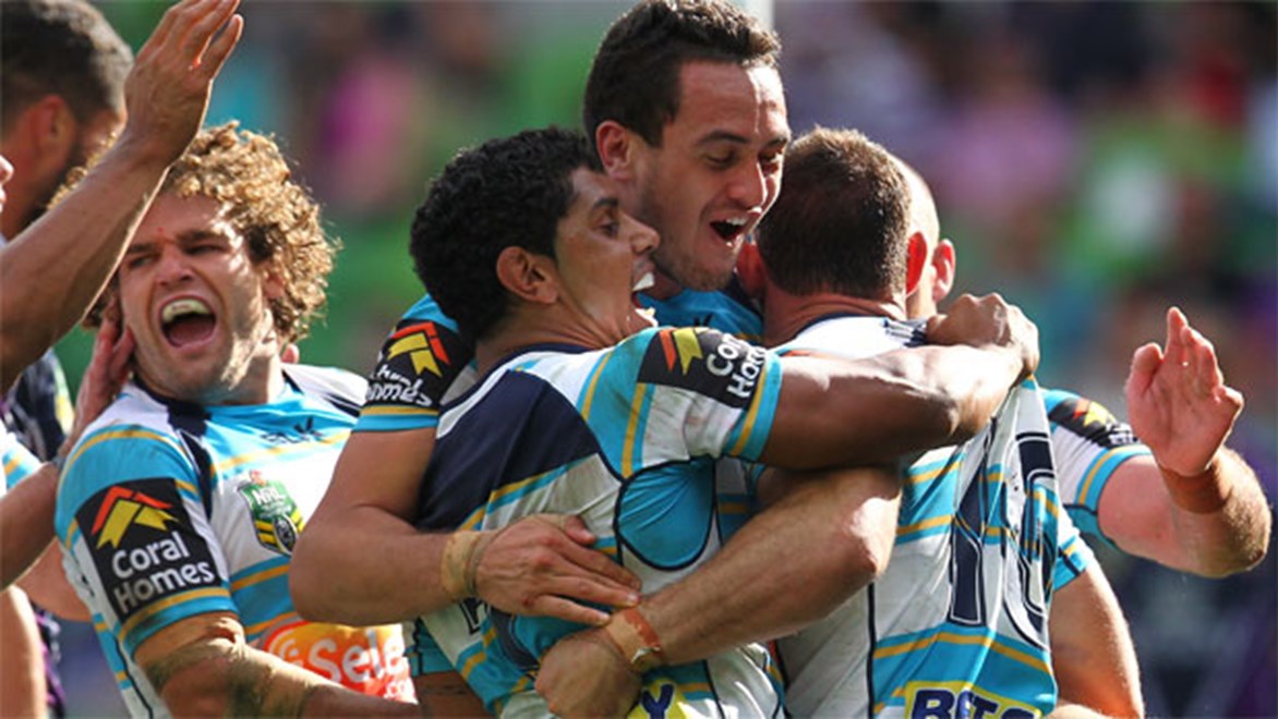 Titans players, seen here celebrating their Round 5 2014 win over the Storm, will be playing out of a new Coomera base from 2016.