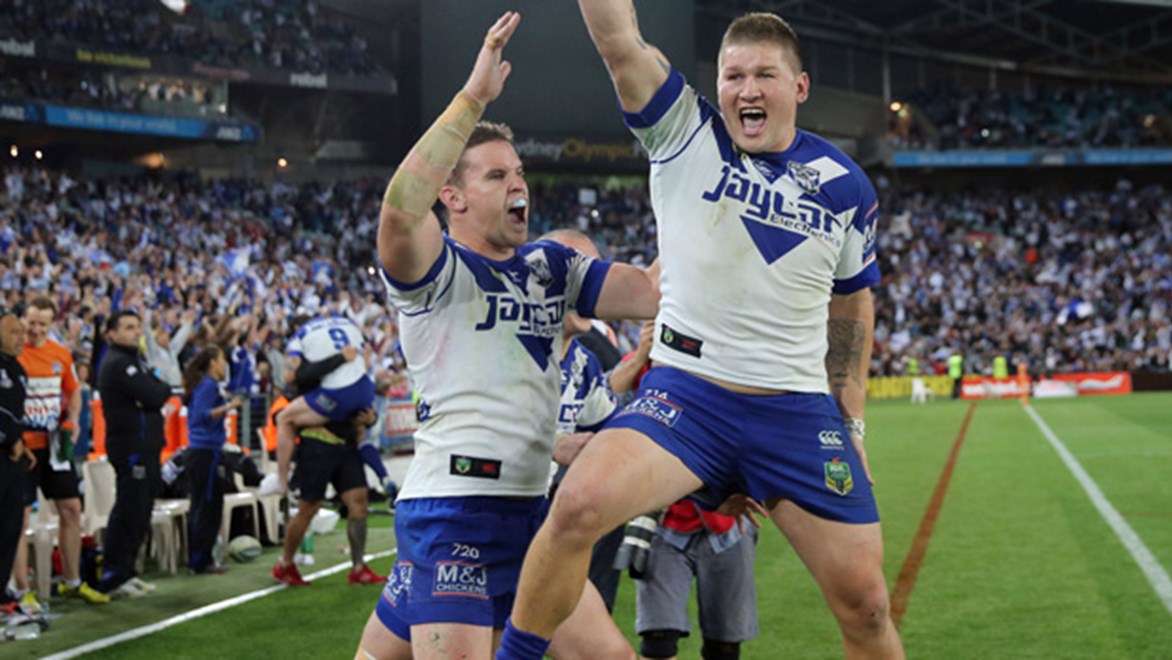 Tim Browne and Greg Eastwood celebrate the Bulldogs' preliminary final win over the Panthers.