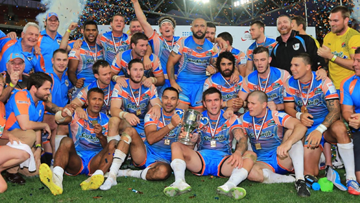 Northern Pride celebrate following their 2014 Intrust Super Cup grand final victory.