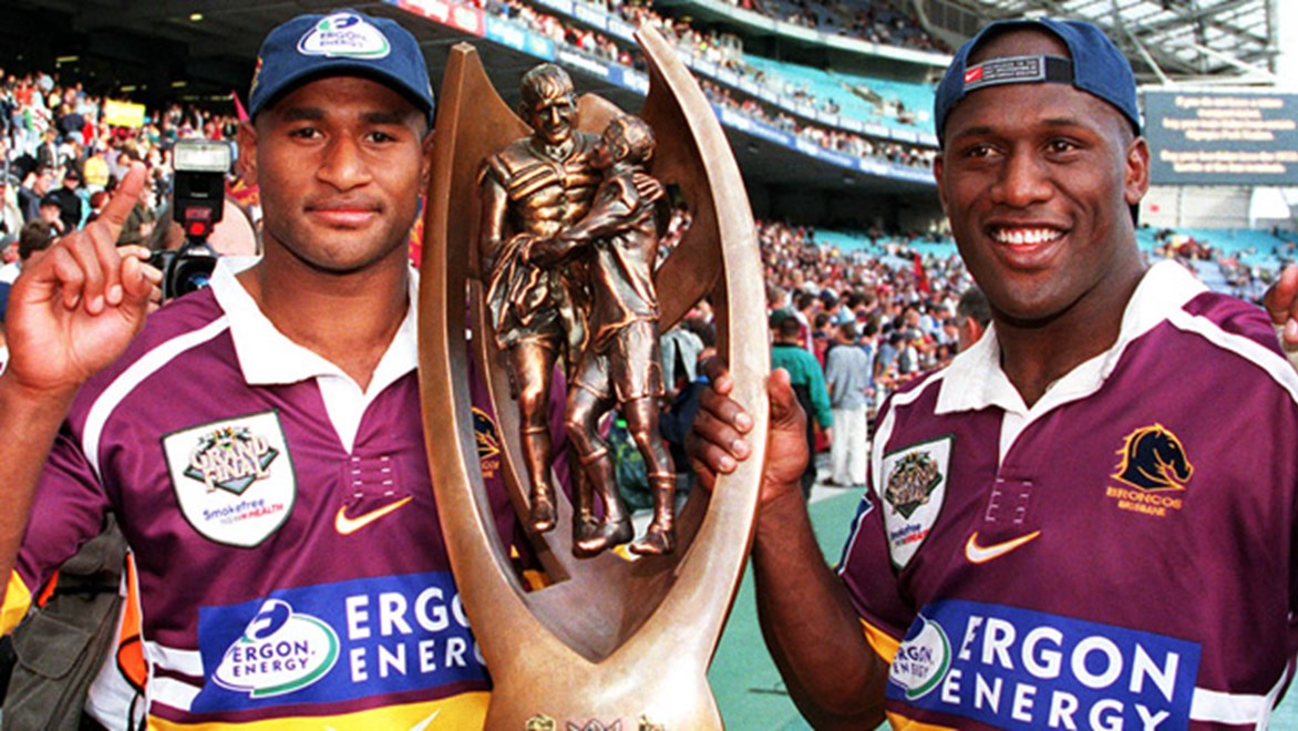 Lote Tuqiri and Wendell Sailor celebrate the Broncos' 2000 NRL premiership win.