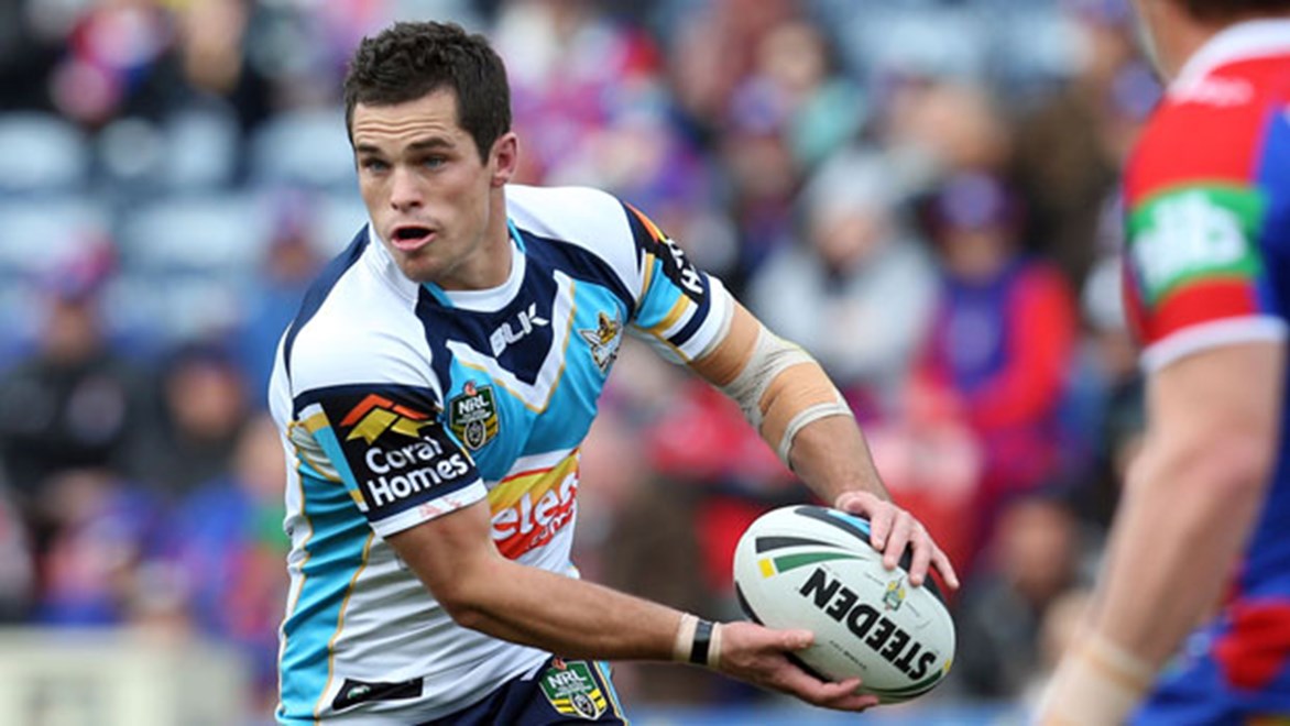 Daniel Mortimer is modelling his game on Johnathan Thurston in order to cement the halfback position at the Titans in 2015.