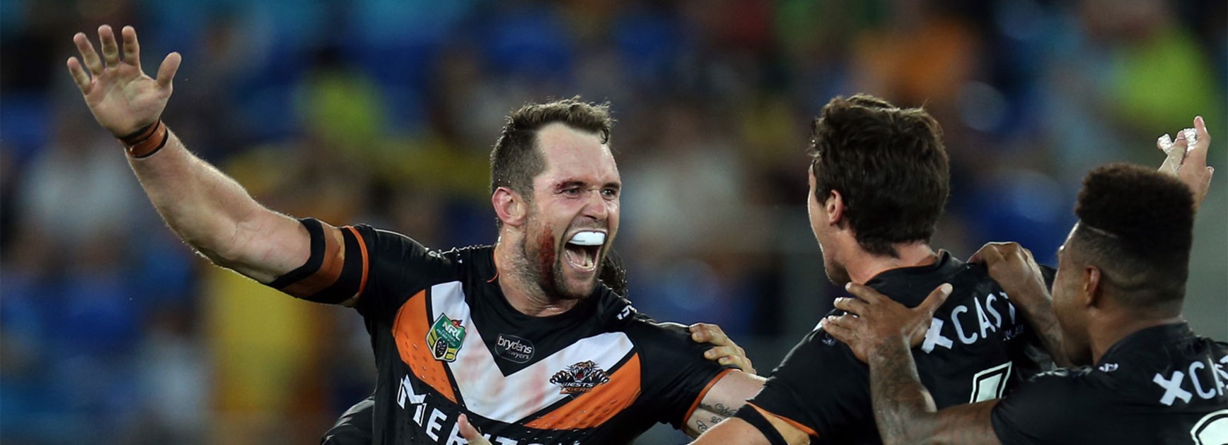 Pat Richards celebrates his match-winning field goal in the Wests Tigers' win over the Gold Coast.