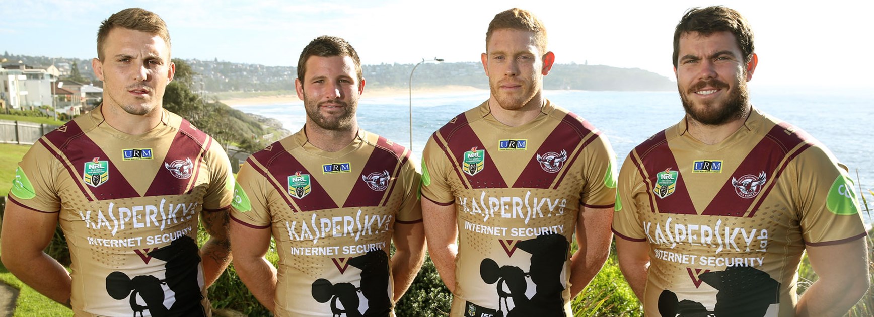 Tyson Andrews, Blake Leary, Tom Symonds and Josh Starling show off Manly's Anzac jerseys.
