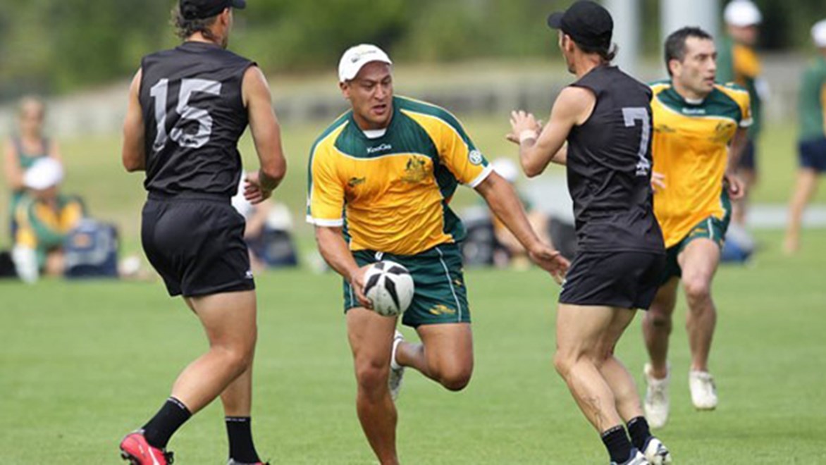 Australia and New Zealand players in action on Day 1 of the 2015 Touch World Cup in Coffs Harbour.