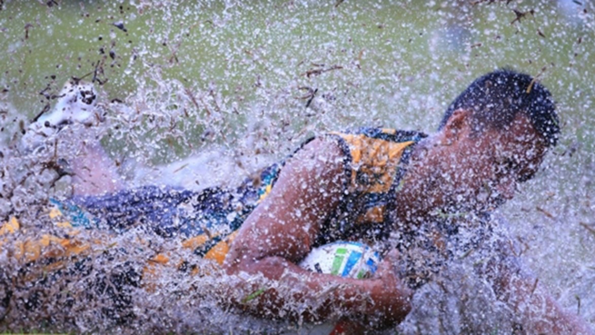 Wet weather made for some tricky conditions on day two of the 2015 Touch World Cup in Coffs Harbour.