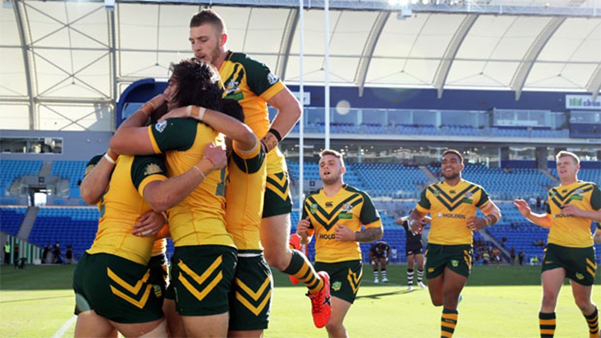 The Junior Kangaroos celebrate a try during their two-point win over the Junior Kiwis on Saturday.