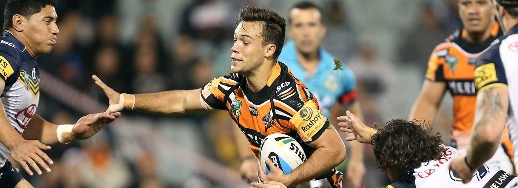 Luke Brooks makes a run against the Cowboys in Round 11.